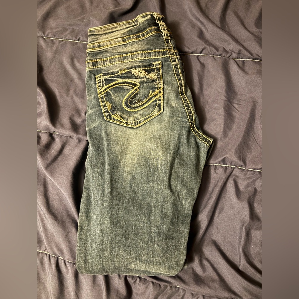 Stylish Women's Silver Skinny Jeans distressed look.